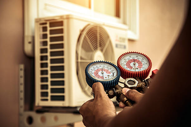 Professional Heat Pump Repair technician working in Andrews, NC